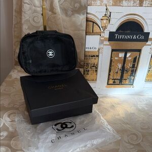 Makeup CC bag appx 2 1/2 in deep, 8c 5 in app
New with original box, packaging